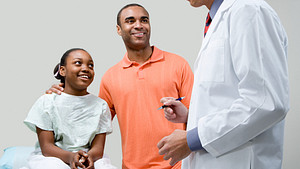 Doctor consultation with a child and parent