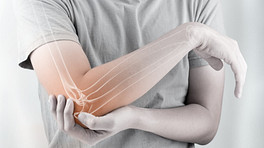 Elbow pain in a skeletal view of the arm.